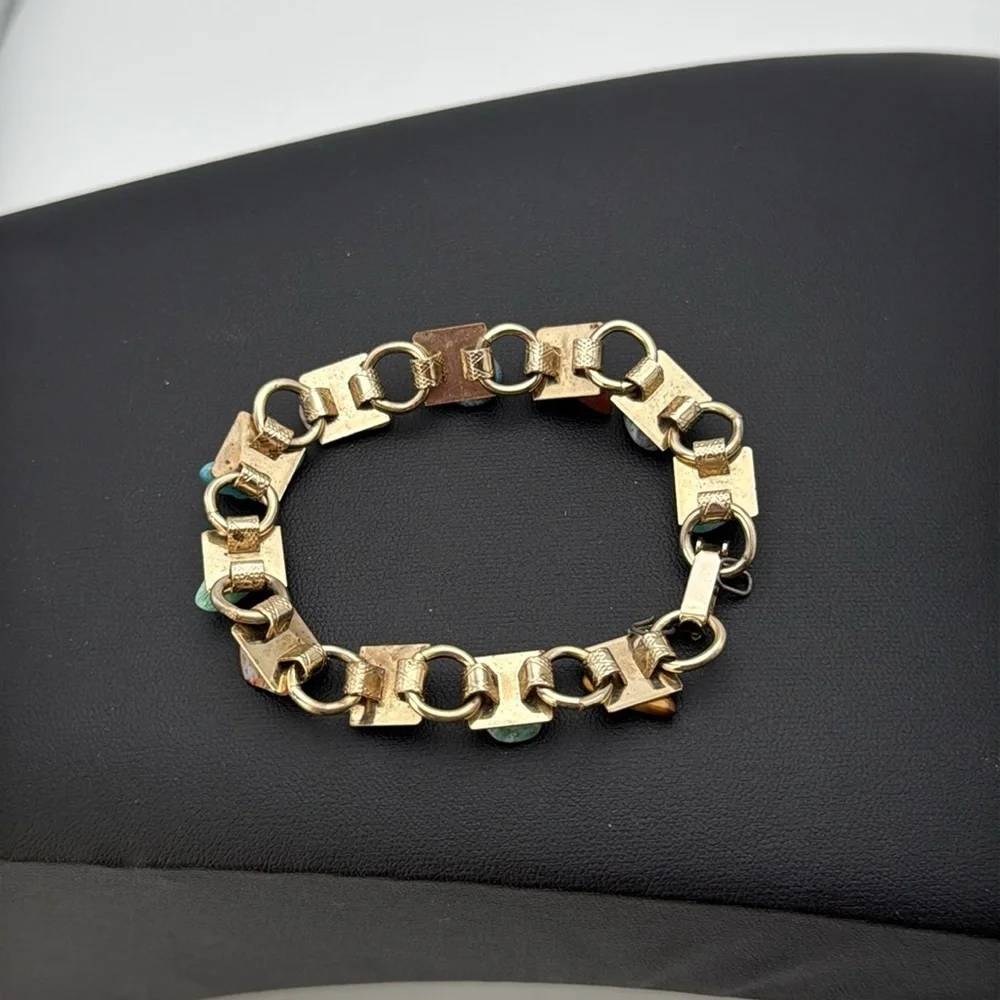 Vintage Gold tone link charm bracelet with various colored “stones” boho hippie